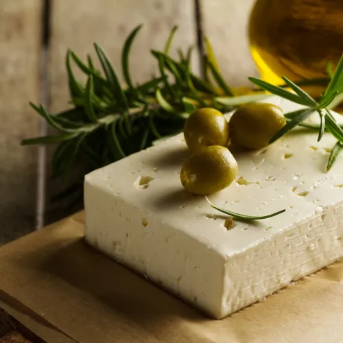 fresh-tasty-greek-green-olives-with-cheese-feta-goat-cheese-closeup-mediterranean-food_1220-1124.webp