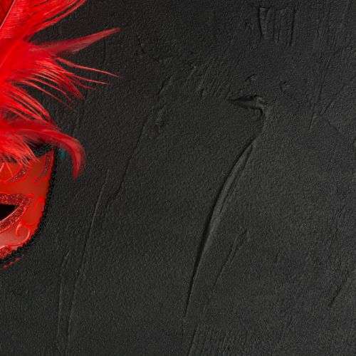 red-mask-dark-table.jpg